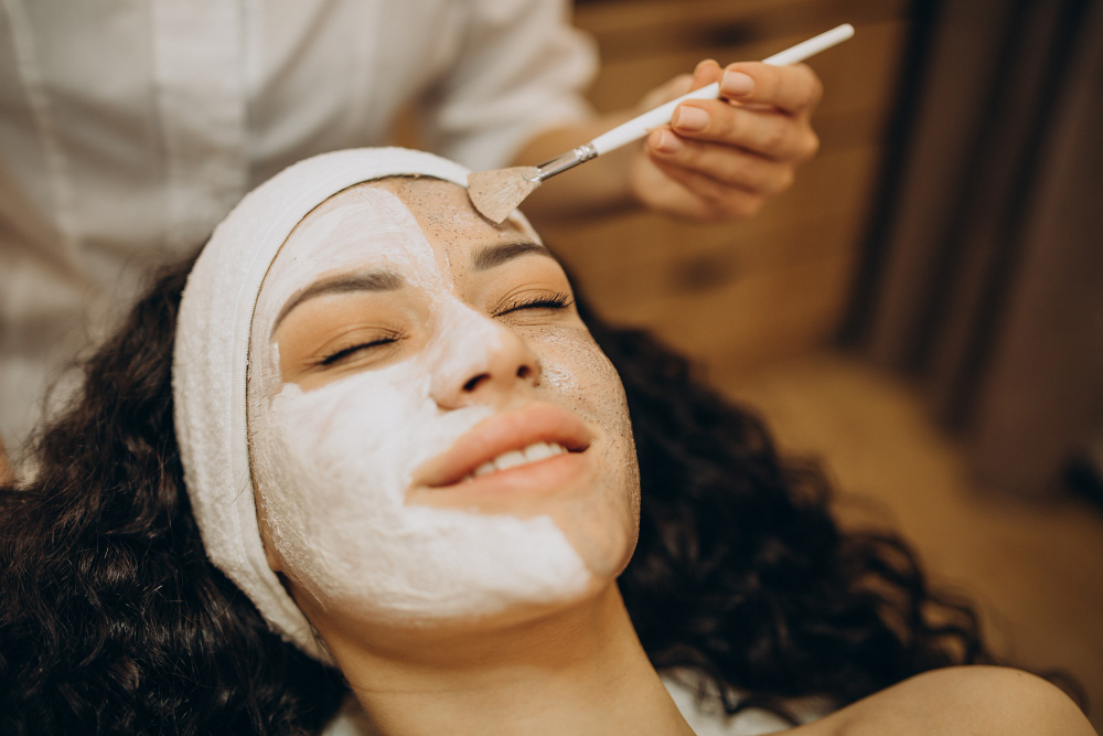 Women doing professional exfoliation procedures for glowing skin.