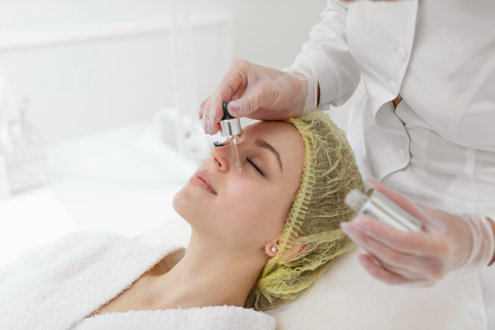 A woman getting a glycolic acid peel in a beauty center.