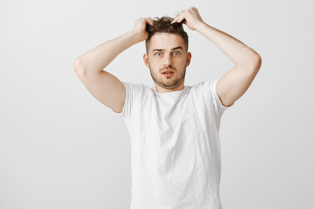 Teenage man with hair loss